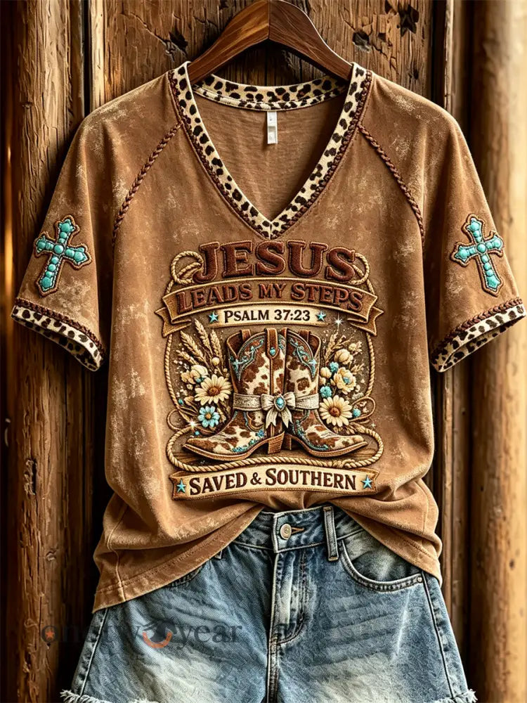 Women’s Jesus Leads My Steps Western Boots Turquoise Cross Print short-sleeved T-shirt - Brown / S