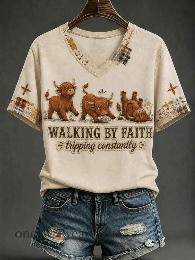 Women’s Walking By Faith Tripping Constantly Highland Cow Short-sleeved T-shirt - Apricot / S